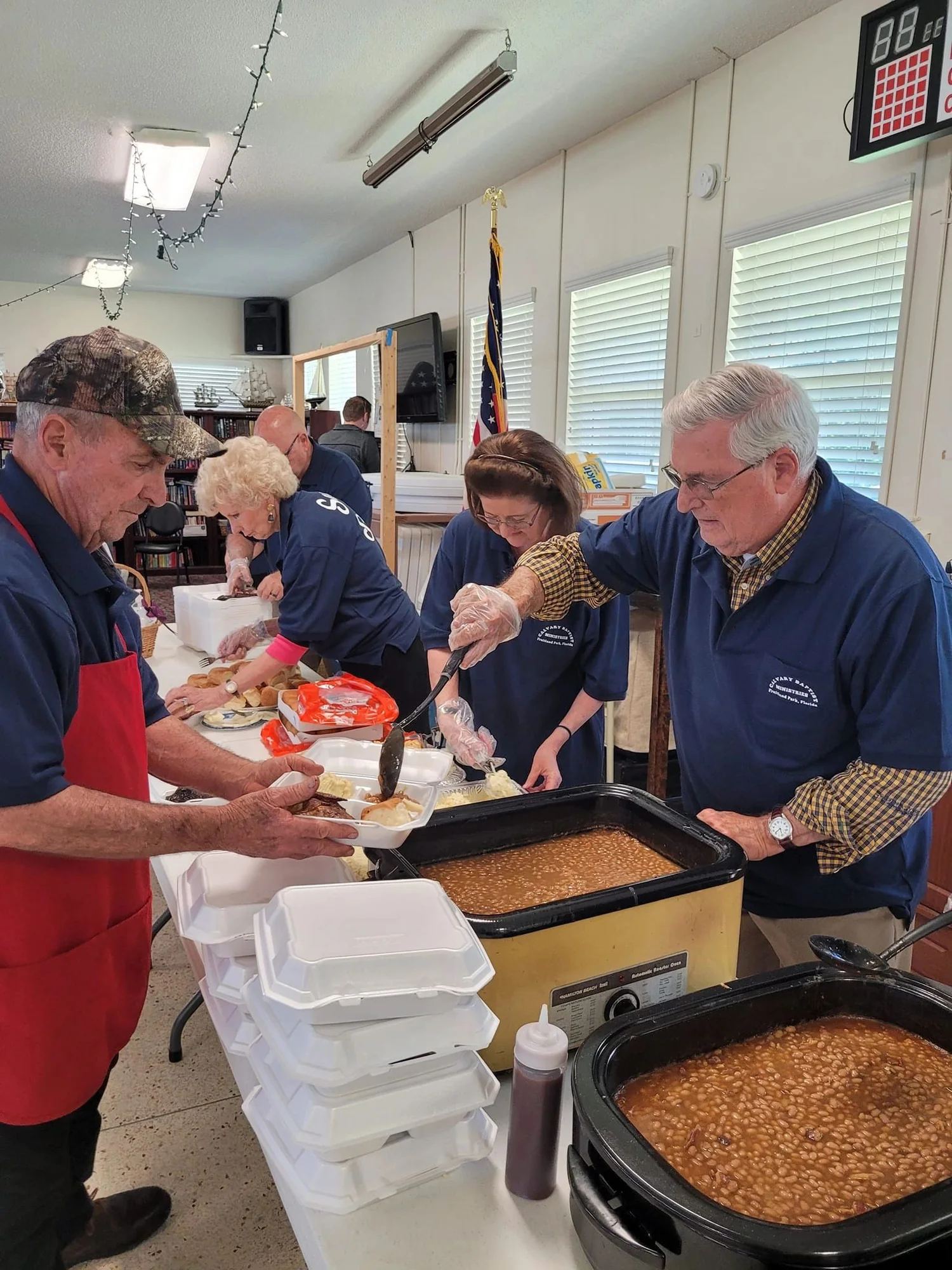 Calvary volunteers serving others